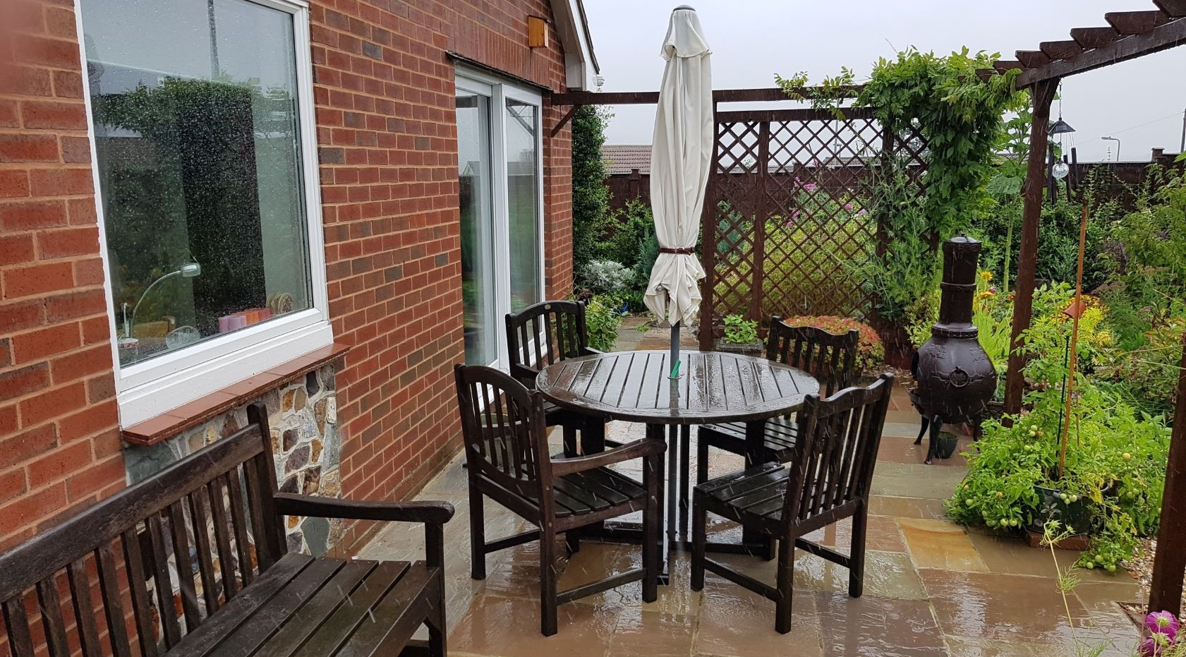 Before Veranda image of a bungalow in Honiton, Devon by All Weather Canopies South West Ltd